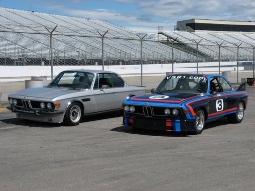 Coupes side by side at the track.